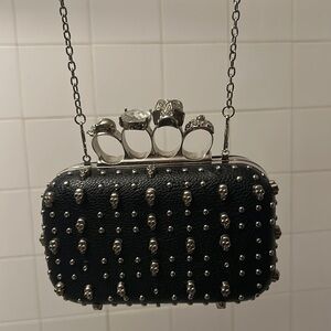 Clutch purse with skulls/brass knuckles